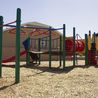 Community playground with slides and climbing structure